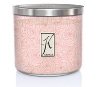Pink candle in a jar with rose line art design and a silver lid, labeled "K Kringle" on the front.