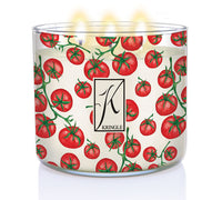 Round candle jar with tomato pattern and three burning wicks, labeled "Kringle."
