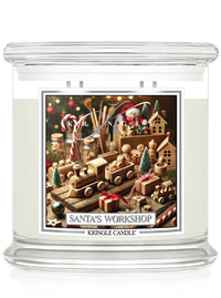 Kringle Candle’s Santa’s Workshop, featuring a festive label with wooden toys, candy canes, and holiday decor, 4-wick.