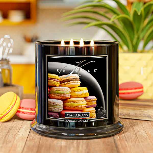 Kringle Candle with macaron cookies design on a wooden surface and 4-wick candle Macarons