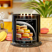 Kringle Candle with macaron cookies design on a wooden surface and 4-wick candle Macarons