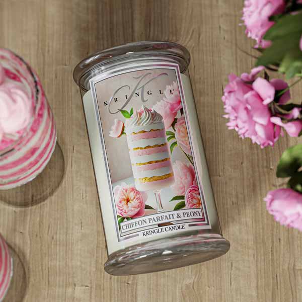 Glass candle jar Chiffon Parfait & Peony with layered dessert and pink peonies.