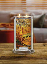 Amber Wood  Large 2-wick lit autumn candle on a table  - Kringle Candle Company