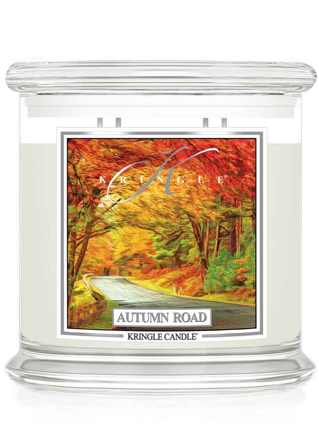 Kringle Candle Autumn Road candle with colorful label on a white background