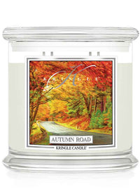 Kringle Candle Autumn Road candle with colorful label on a white background