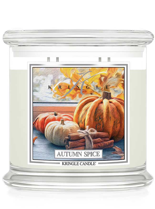 Kringle Candle Autumn Spice 4-wick candle with pumpkin and cinnamon design on a white background