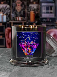 Kringle Candle Cosmo in a decorative holder with colorful label