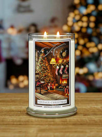 Kringle Candle Vintage Christmas Candle with Christmas scene on a wooden table