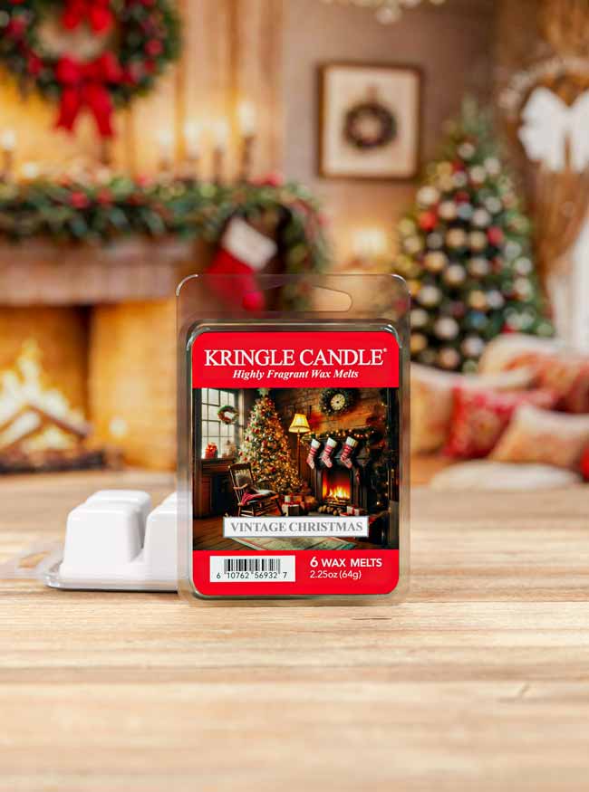 Kringle Candle Vintage Christmas wax melt packaging on a table with a festive background