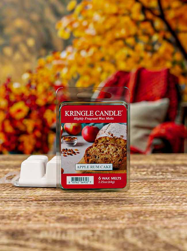 Wax melts in a transparent package. Label shows an apple rum cake with apples and spices in the background.