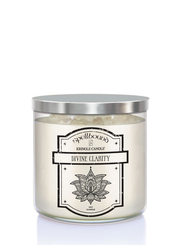 Candle with a silver lid and 'Divine Clarity' label on a white background showing front of candle