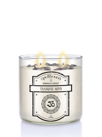 Lit Candle with 'Spellbound' label and 'Tranquil Mind' text on a white background