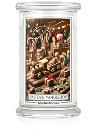 Kringle Candle, large jar labeled "Santa's Workshop," features festive Christmas toys and decorations on the label.