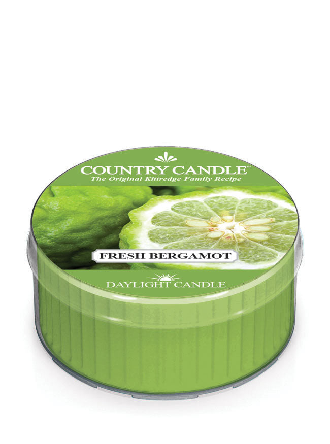 Green candle tin labeled