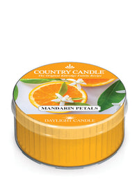 Orange candle labeled "Country Candle, Mandarin Petals, Daylight Candle" with an image of an orange slice and flowers.