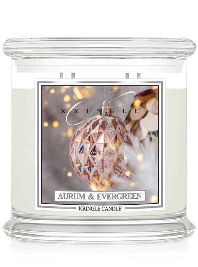 Kringle Candle with 'Aurum & Evergreen' scented 4-wick candle with ornaments label