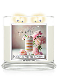 A glass jar candle labeled "Chiffon Parfait & Peony" with an image of a parfait and pink peonies.