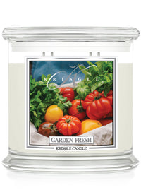 Kringle Candle jar labeled "Garden Fresh" with an image of tomatoes and greens on the front.