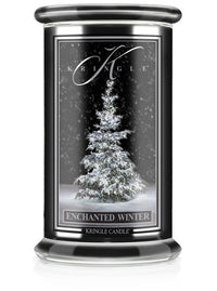 Kringle Candle with a snowy tree design on a white background