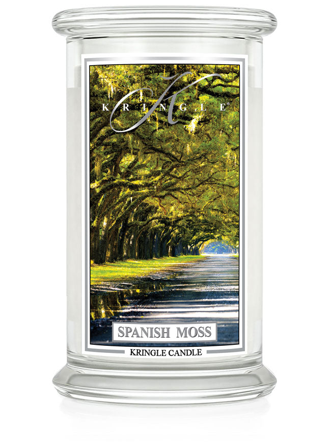 Clear glass candle jar labeled