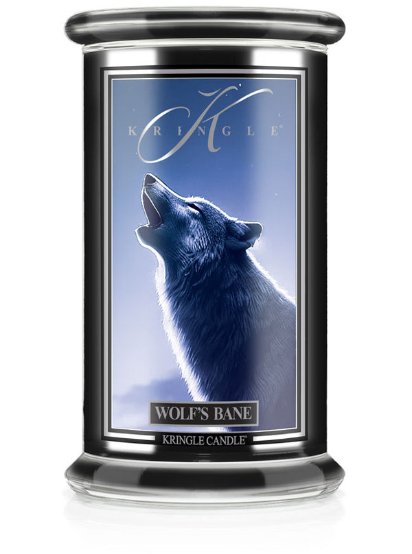 Unlit Halloween candle labeled "Wolf's Bane" with an image of a howling wolf under a blue sky.