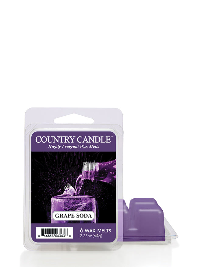 Purple packaging of Country Candle grape soda wax melts, showing a bottle pouring liquid into a glass.