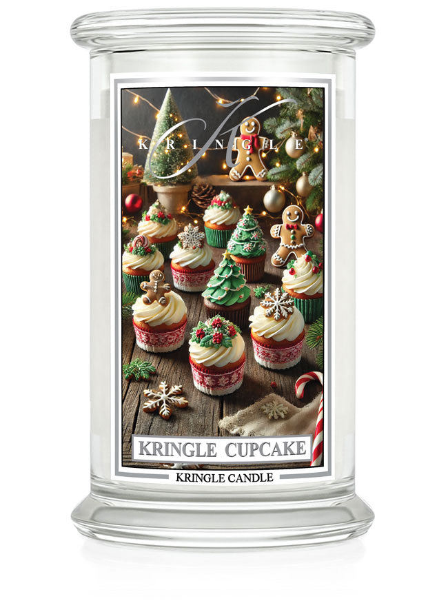 Kringle Cupcake scented candle in a large jar, featuring festive cupcakes with Christmas decorations on the label.
