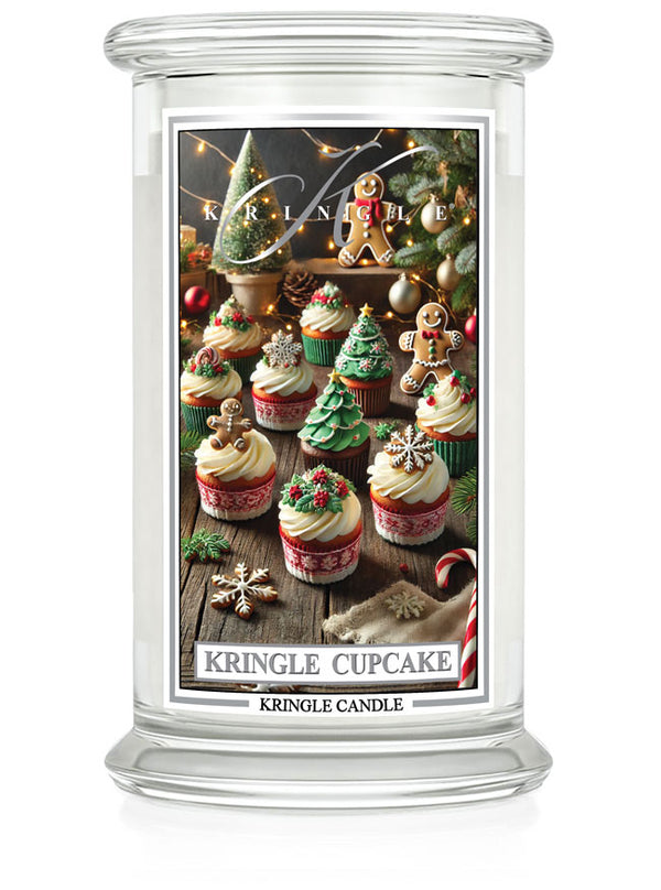 Kringle Cupcake scented candle in a large jar, featuring festive cupcakes with Christmas decorations on the label.