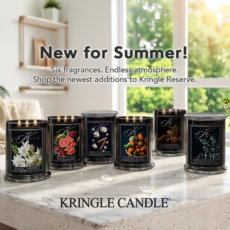 Kringle Candle candles on a marble surface with a window view, featuring 'New for Summer!' text.