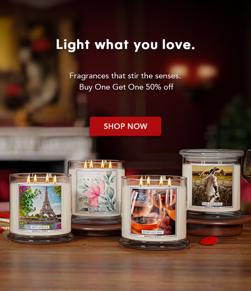 Kringle Candle collection mobile image shown in a cozy, elegant interior with lit candles, highlighting the message “Light what you love” and a Buy One Get One 50% off offer.