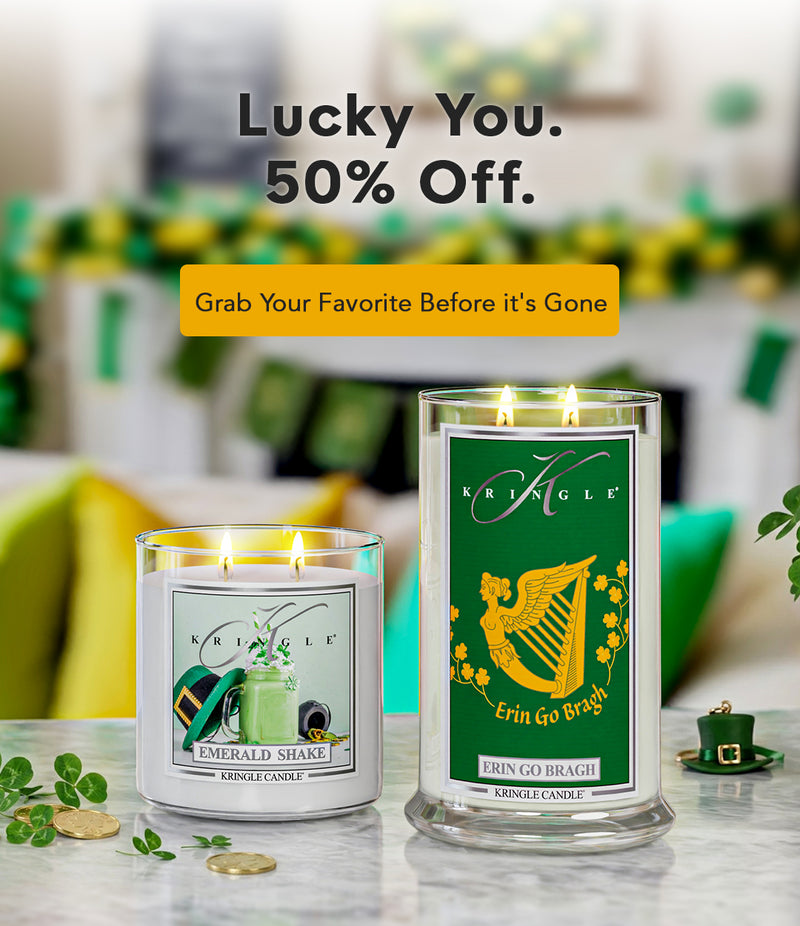 Two Kringle Candle scented candles on a table with promotional text overlay.