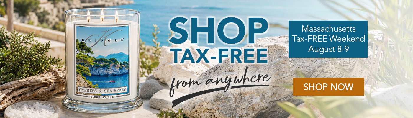 A jar candle labeled 'Caribbean & Sea Spray' is shown on a beach-themed promotional banner with large text reading 'SHOP TAX-FREE from anywhere,' a blue 'Massachusetts Tax-Free Weekend August 8-9' box, and an orange 'SHOP NOW' button.