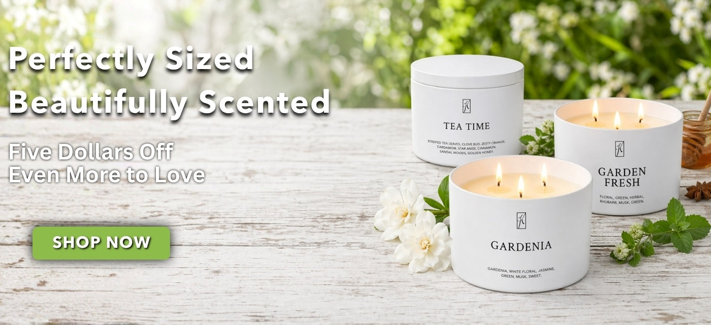 Three scented candles on a wooden surface with text promoting a discount.