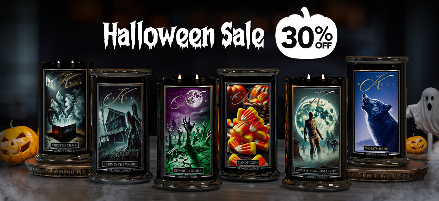 Halloween-themed candles with a sale banner on a dark background