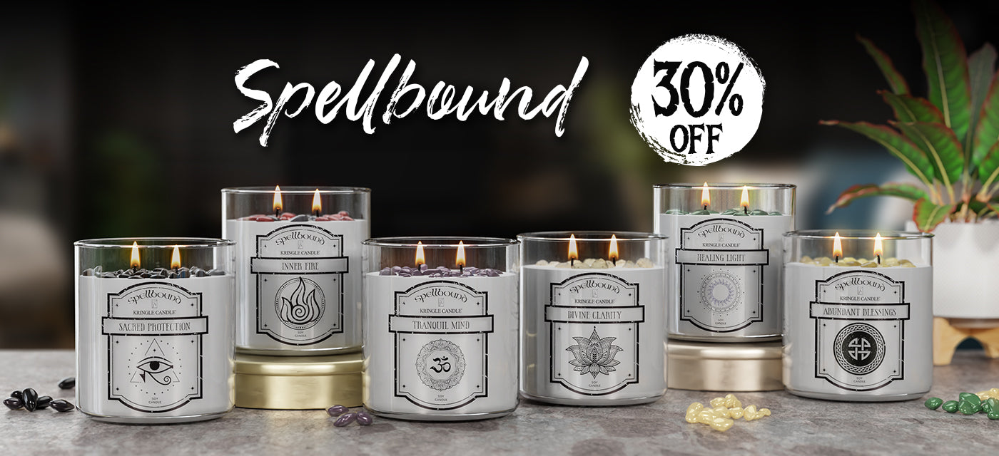Set of candles with decorative labels on a dark background, featuring 'Spellbound' and a 30% off promotion.