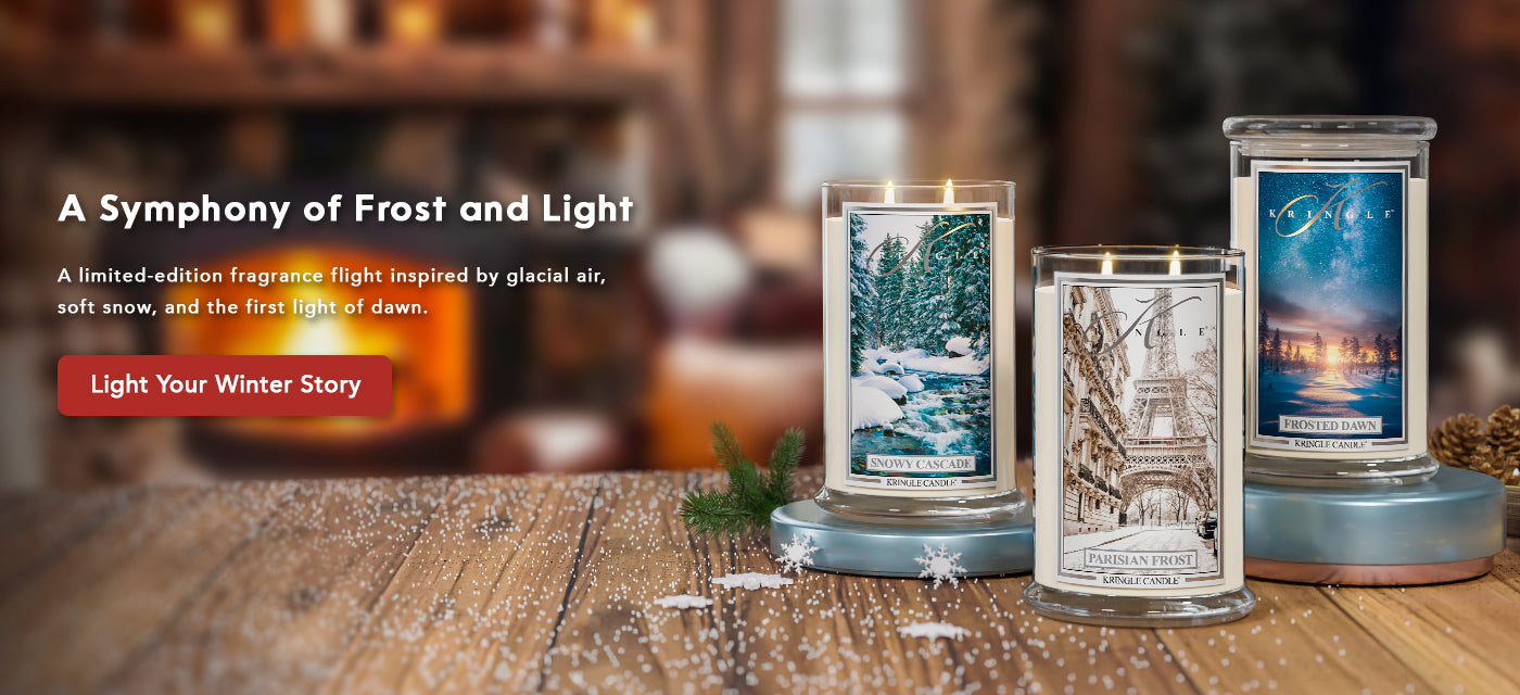 Three candles on a wooden surface with a blurred background