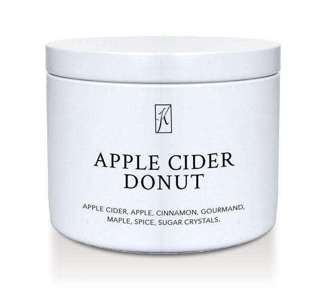 Jar of 'Apple Cider Donut' candle on a white background