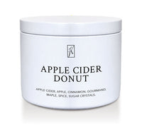 Jar of 'Apple Cider Donut' candle on a white background