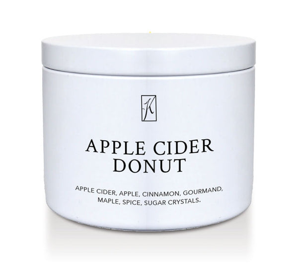 Jar of 'Apple Cider Donut' candle on a white background