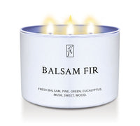 Candle in a white container labeled 'Balsam Fir' with flames on a white background