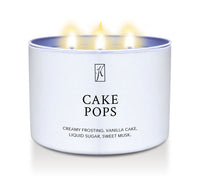 Candle in a white container labeled 'Cake Pops' with flames on a white background.