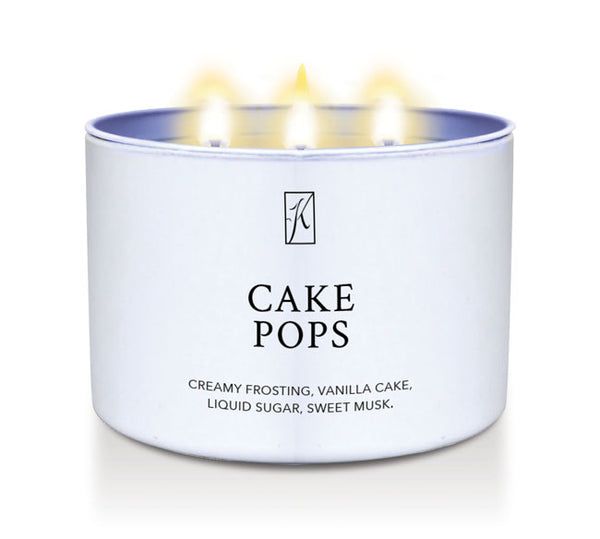 Candle in a white container labeled 'Cake Pops' with flames on a white background.