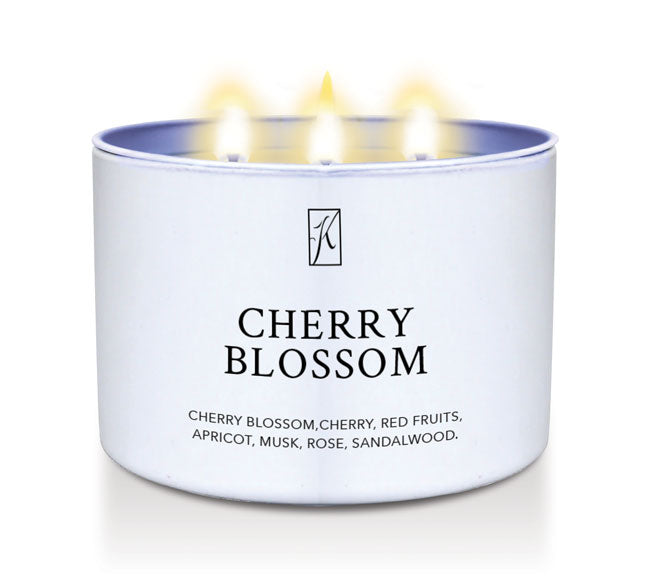 'Cherry Blossom' scented candle in a white tin on a white background by Kringle Candle