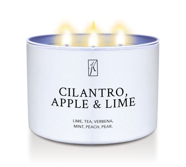 White Candle tin with 'K' Kringle Candle logo and 'Cilantro, Apple & Lime' text on a white background