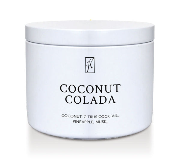 Coconut colada scented candle tin on white background by Kringle Candle