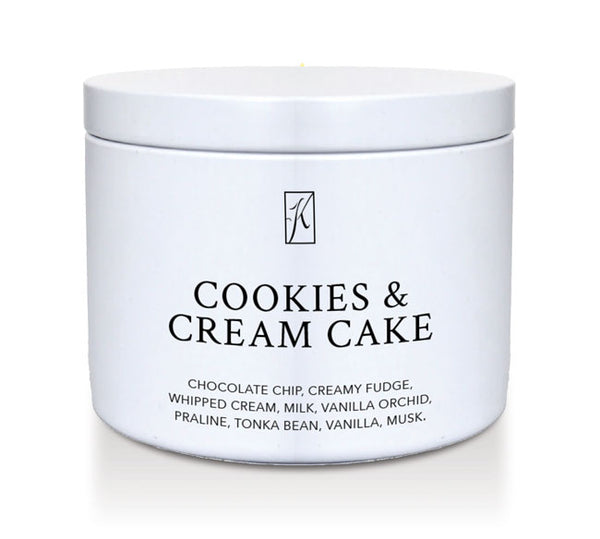  'Cookies & Cream Cake' candle in a tin container on a white background.
