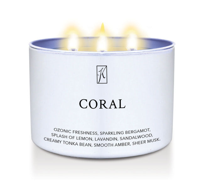 Candle in a white tin container with 'K' logo and 'CORAL' text on a white background by Kringle Candle.