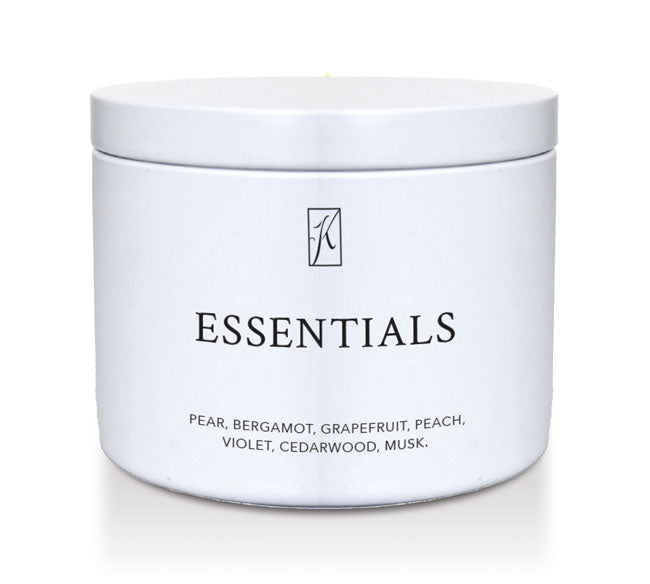 'Essentials' scented candle in a white limited edition candle tin with a Kringle Candle logo on a white background
