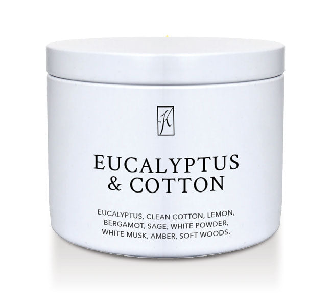 Jar of candle with 'Eucalyptus & Cotton' fragrance on a white background
