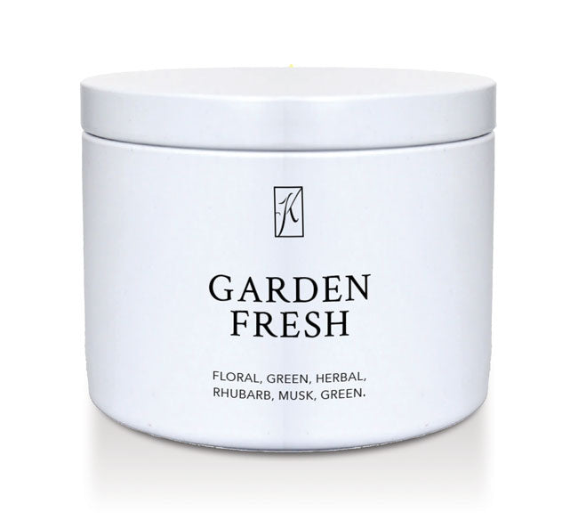 White tin candle with 'Garden Fresh' text on a white background by Kringle Candle